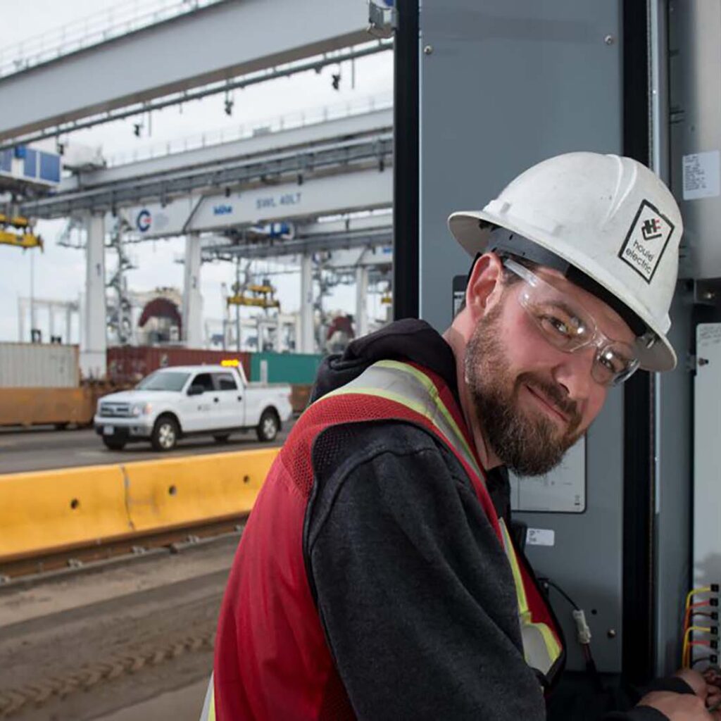 Deltaport Terminal Field Staff Working on Control Panel