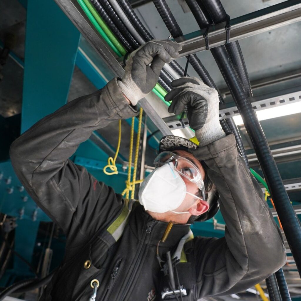 Neptune Terminals Coal Facility Upgrade Teck Cable Being Installed by Electrician