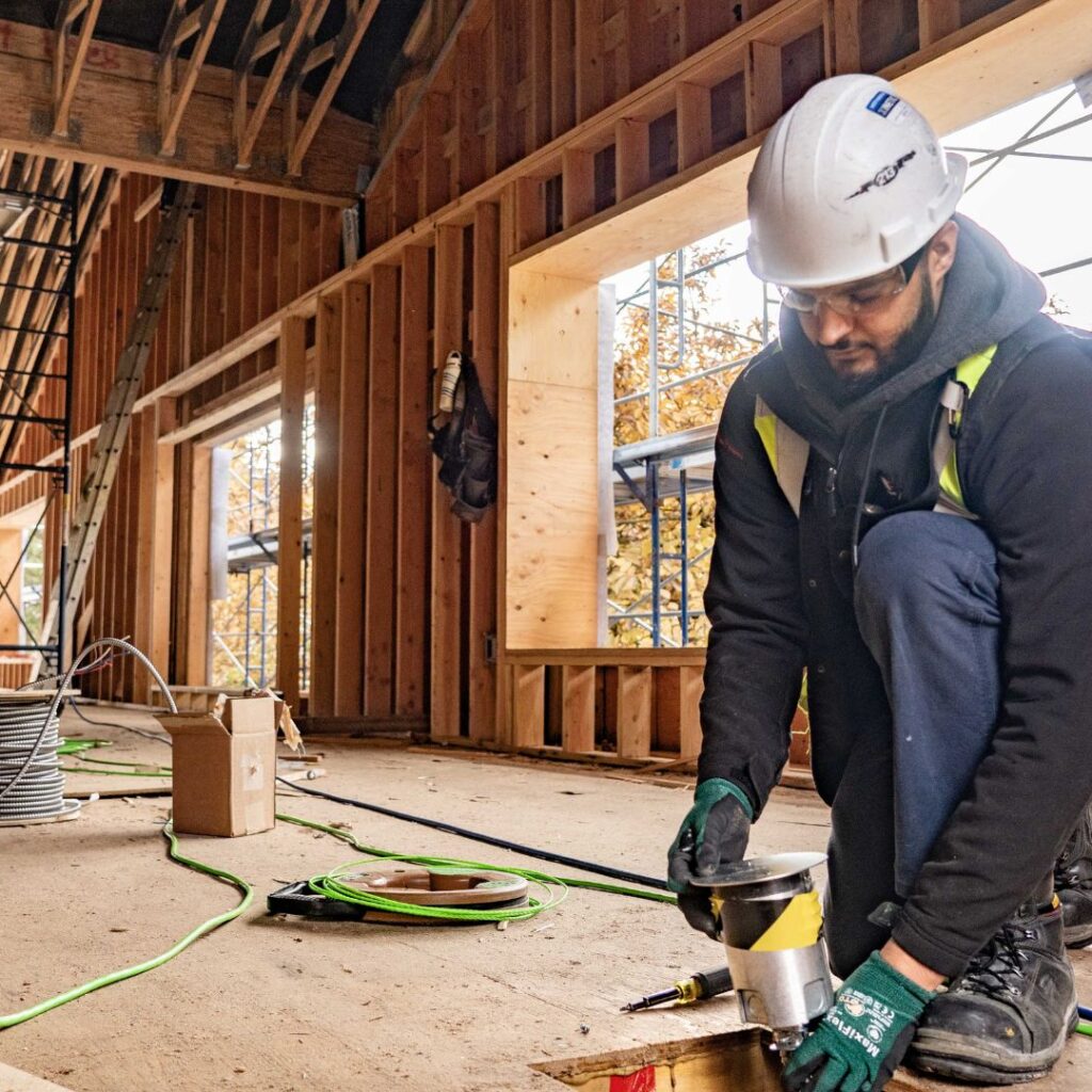 Third Space Commons Field Staff Installing Electrical Net-Zero Carbon Sustainable Building