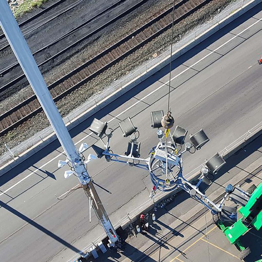 Deltaport Terminal High-mast Lighting Fixture Being Lifted Into Place