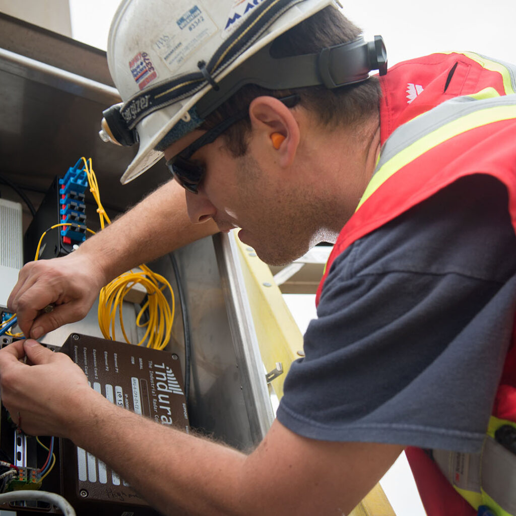 GCT Deltaport Terminal Road and Rail Improvement Project Electrician Working on Communications Panel