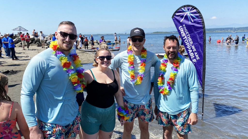 Houle staff participating in the Surrey Hospital Foundation Champion of the Crescent stand-up paddleboard race.
