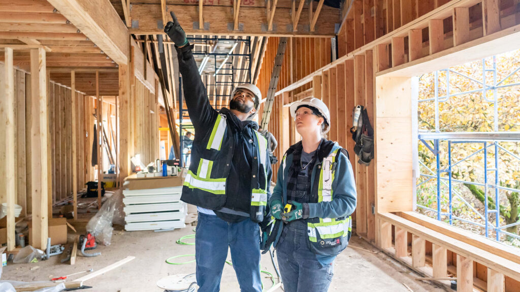 Houle electricians working at Third Space Commons building project, at UBC