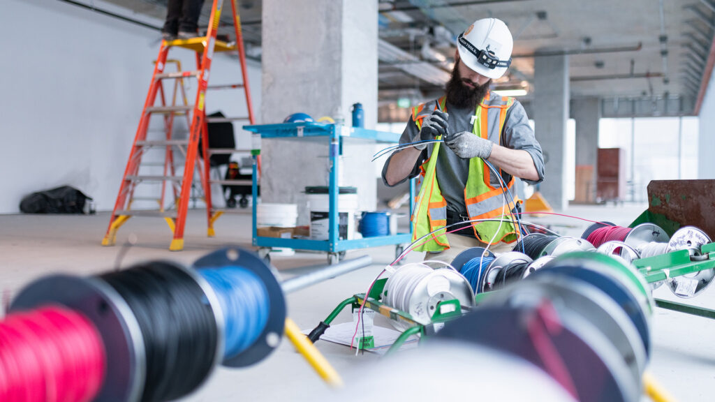 Houle Electrician working on wiring