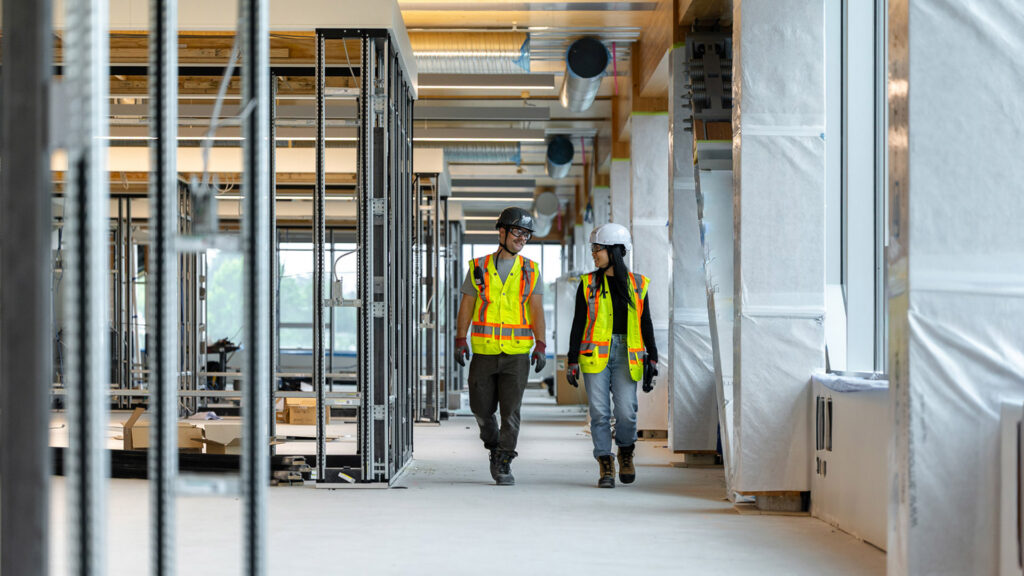 Houle Site Team Walking Together on Site