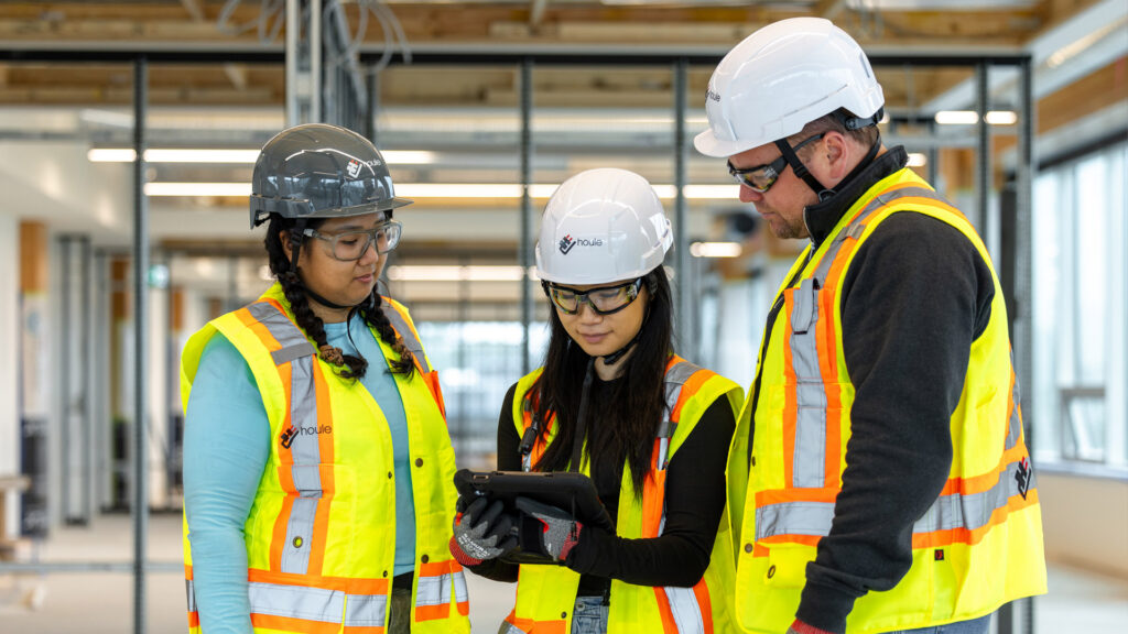 Houle team collaborating on site