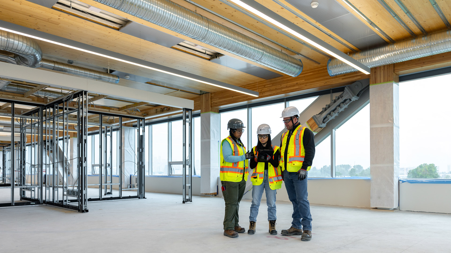Houle team collaborating on site