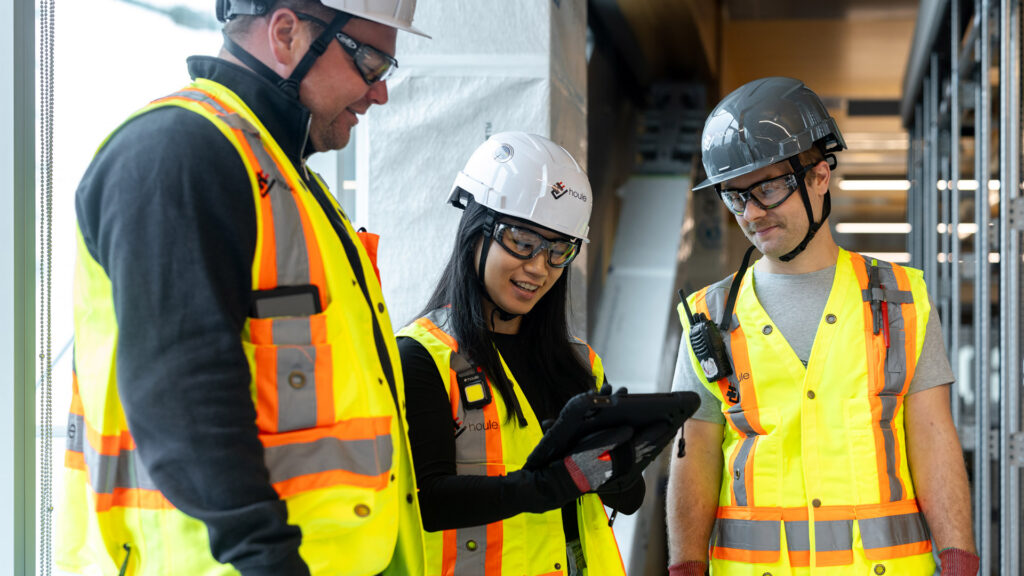 Houle team collaborating on site